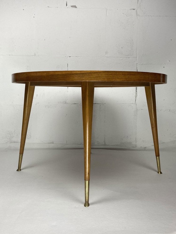 Image 1 of Table ronde italienne à pieds coniques en laiton, 1950S