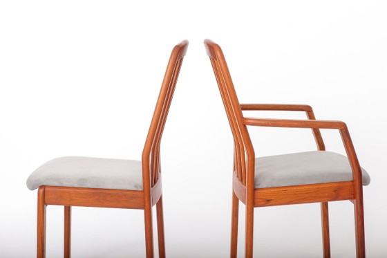 Set van 6 vintage teakhouten eetkamerstoelen van Dyrlund, 2 fauteuils en 4 stoelen zonder armleuningen, Deens (photo 7 of 8)
