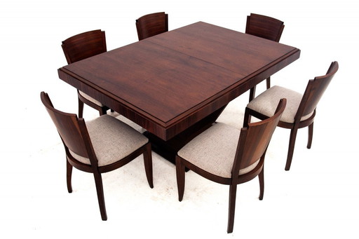  zoom_in Original walnut extendable table, designed by Louis Majorelle, with 6 Art Deco chairs.