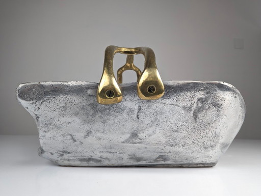 firewood holder by David Marshall, 1980s