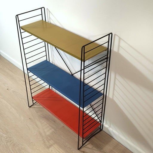 Mid century free standing rack with metal shelves by A. Dekker for Tomado