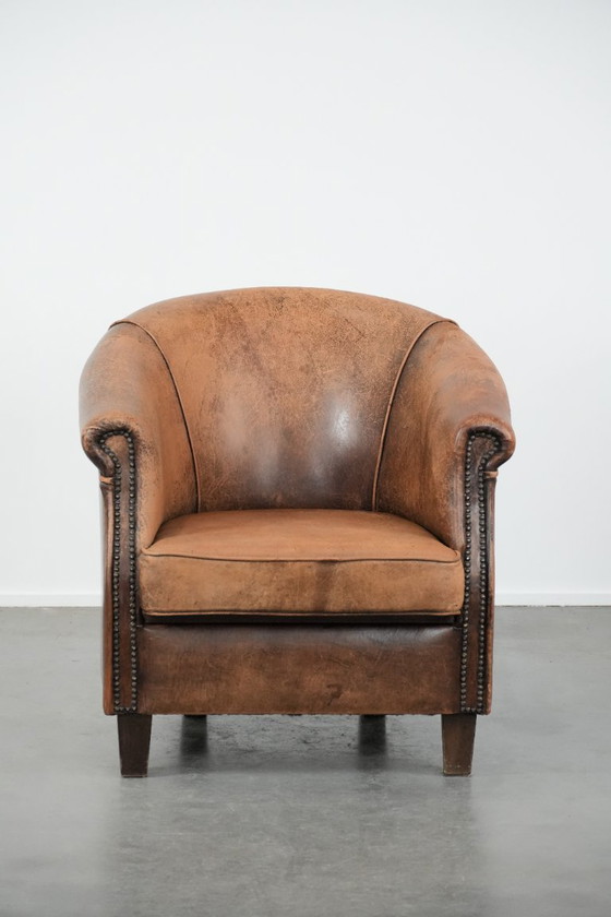 Image 1 of Timeless vintage sheepskin club armchair with character and a beautiful patina