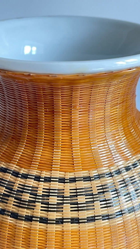 Image 1 of Vintage Woven Bamboo and Fine Porcelain Vase