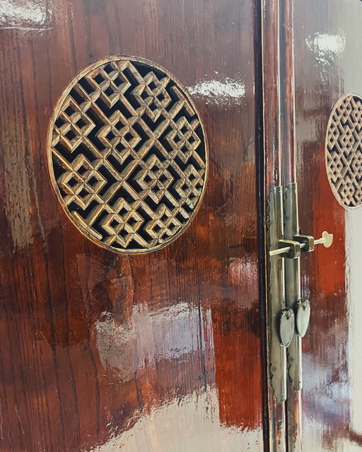 Antique Chinese Cabinet with Carved Wood Details