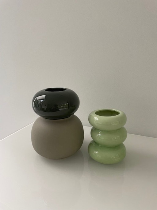 Set of 2 sculptural design vases in green and taupe