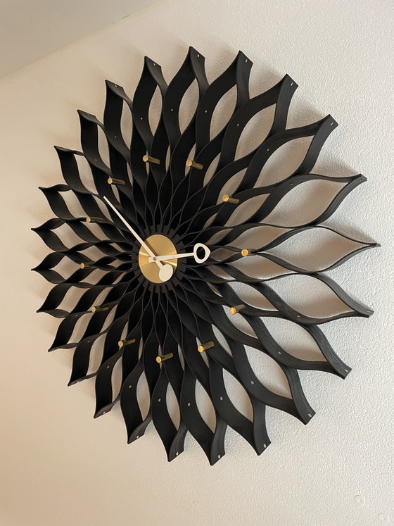 Vitra Sunflower Clock, an iconic design wall clock designed by George Nelson – Metal, Wood (photo 2 of 5)