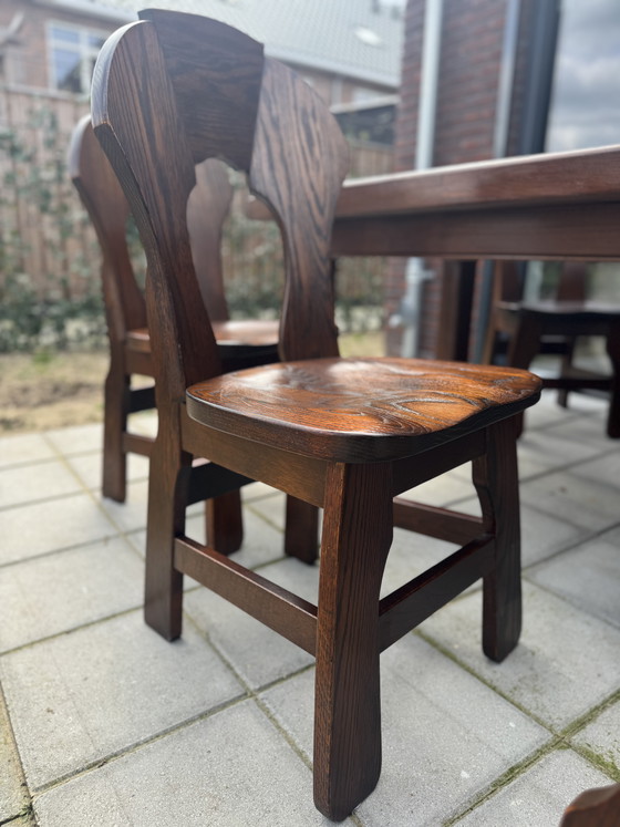 Image 1 of Brutalist eetstoelen (6st) en eettafel