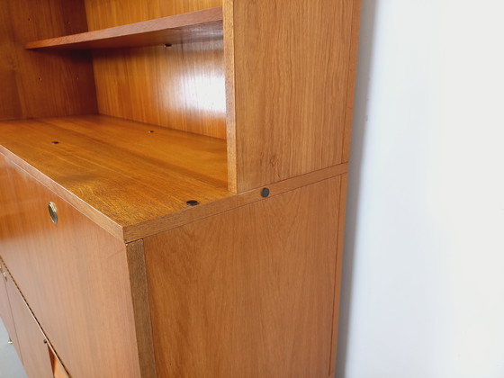 Image 1 of Louis Paolozzi's vintage modernist secretary bookcase for Monopoly in teak and metal from the 60s