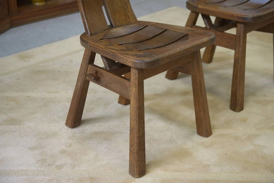 Brutalist pair of chairs by De Puydt in oak, 1960s. – Dining chairs (photo 5 of 9)