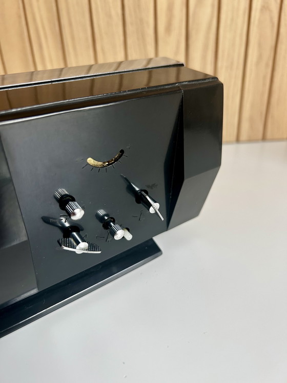 Image 1 of Vintage desk clock with flip date, made in Shanghai China.