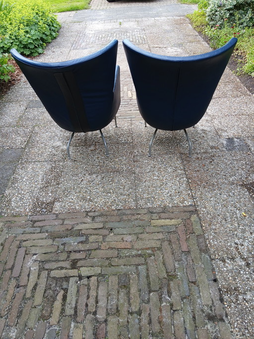 2 fauteuils en cuir bleu
