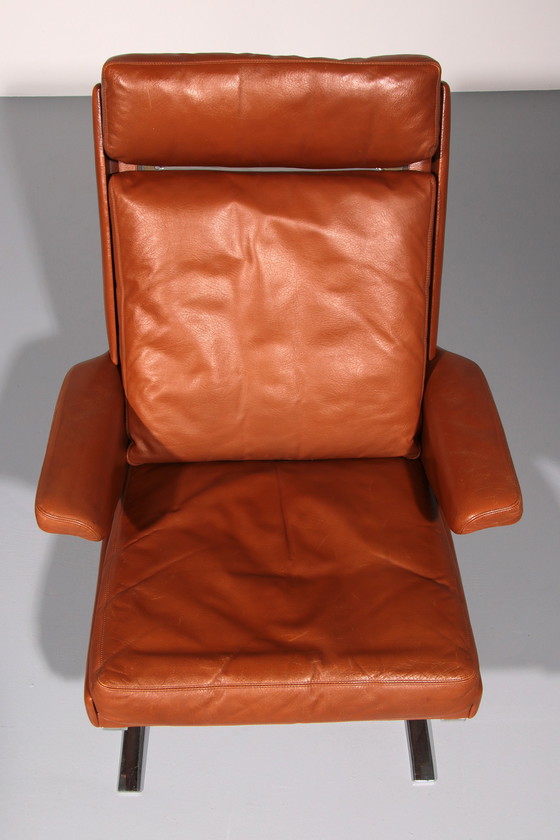 Image 1 of Cognac Leder COR Swing Lounge Stuhl mit Ottomane von Adolf & Schöpfer 1976