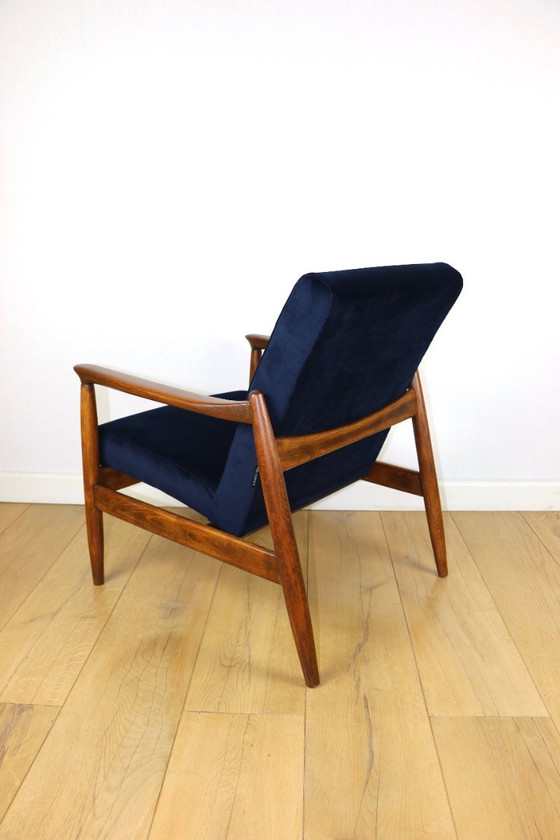 Image 1 of GFM-64 armchair, design by Edmund Homa from the 70s, navy blue - dark wood