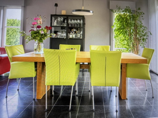 Oak dining table with 6 leather chairs