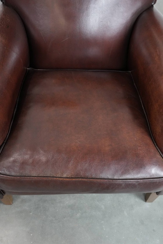 Image 1 of 2 x Schaffellsessel mit zeitlosem Look und wunderschönen dunklen Farben