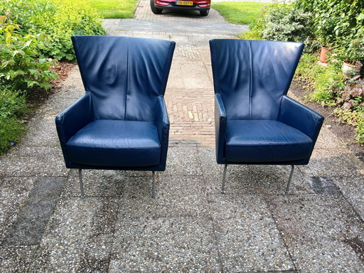 2 fauteuils en cuir bleu