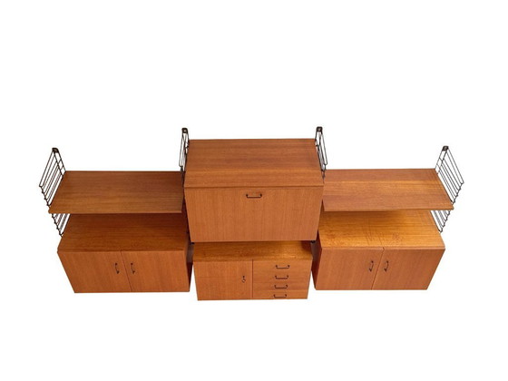 Image 1 of Teakhouten modulair wandsysteem Musterring – breed wandmeubel