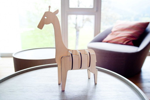 Giraffe-shaped wooden decoration by Ulap design