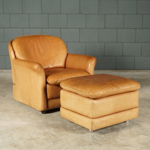 Sillón vintage de cuero con reposapiés – Hans Kaufeld – Años 70