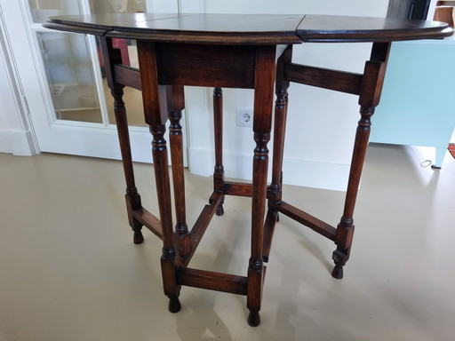 Antique oval folding side table