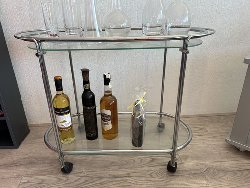 Serveertrolley van glas en aluminium met 5 karaffen