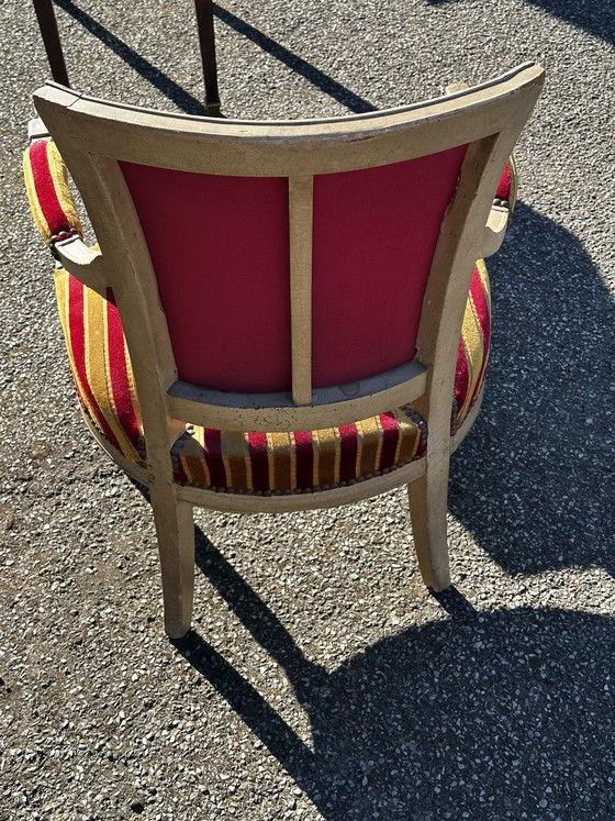 Image 1 of Louis XVI cabrioletfauteuil - Gepatineerd hout en gestreept fluweel