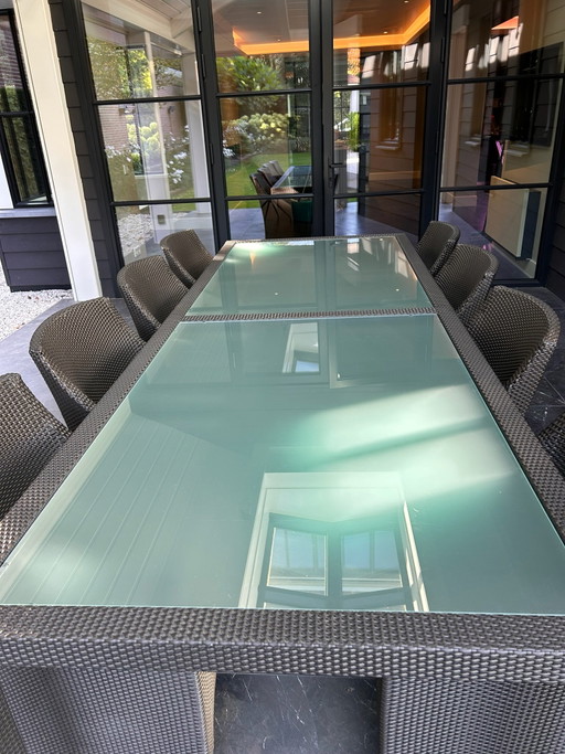 Set de exterior Dedon. Mesa con 8 sillas