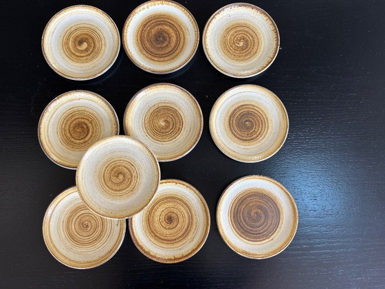 Image 1 of Longchamp zandstenen bord service 42 stuks