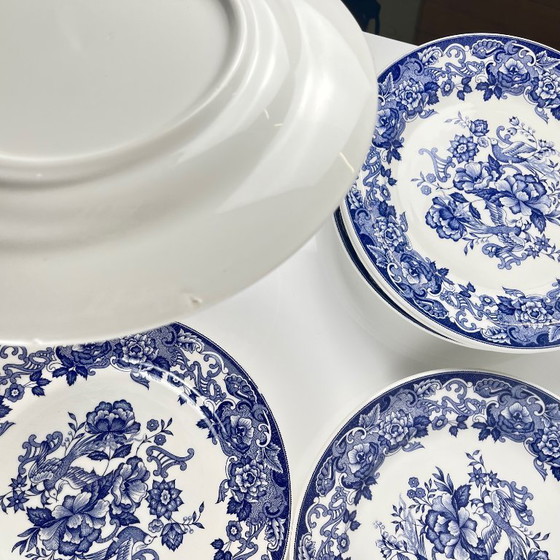 Image 1 of Set of 8 blue earthenware dinner plates with floral and bird decoration, early 20th century