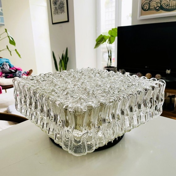 Image 1 of A large flush mount designed for both wall and ceiling application, in the 1970s.  This particular type of fixture tends to sit 