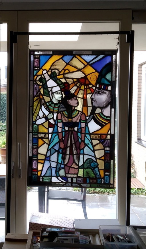 Stained glass in hanging exhibition rack.