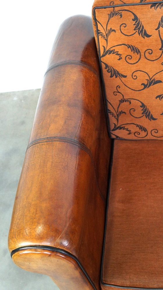 Image 1 of Cómodo sofá de piel de oveja de 2,5 plazas con cojines de tela