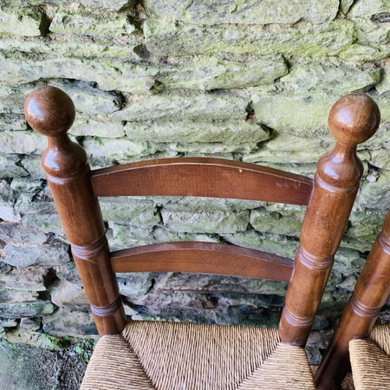 Image 1 of Set van 4 massief houten stoelen met rieten zittingen