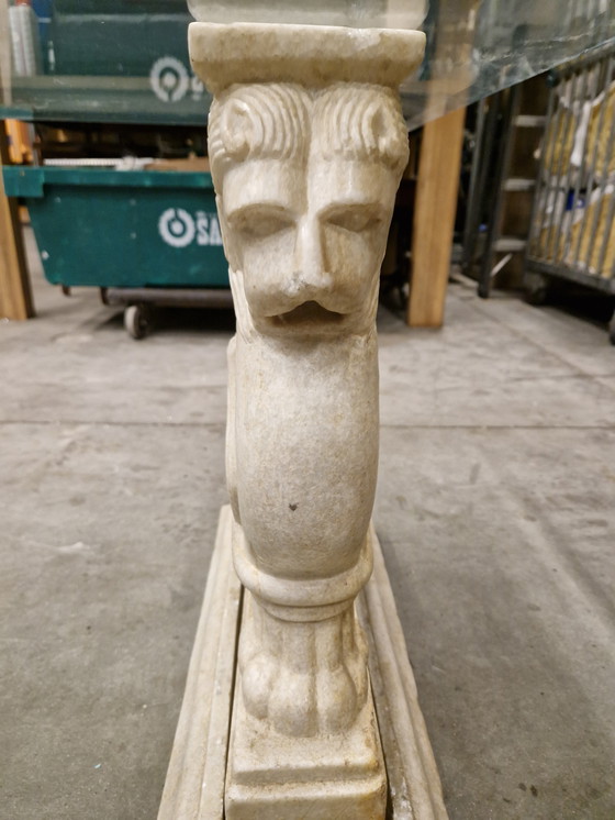 Image 1 of Classic coffee table with glass top and marble pedestals | 109 x 68 x 52 cm