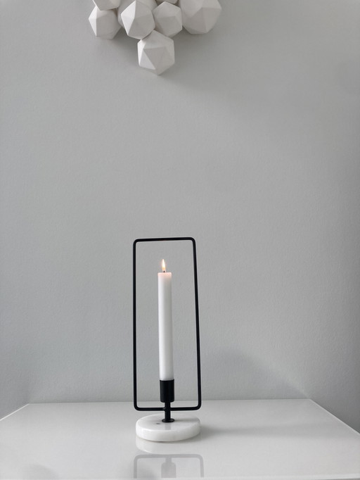 Tough Candlestick Of Sleek Black Steel With White Marble Base