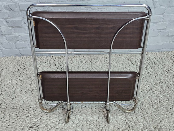 Image 1 of Vintage Foldable and Mobile Chrome Steel 2 Faux Wood Layers ‘Dinett’ Serving Trolley by Bremshey Gerlinol, Germany, 1970s. 