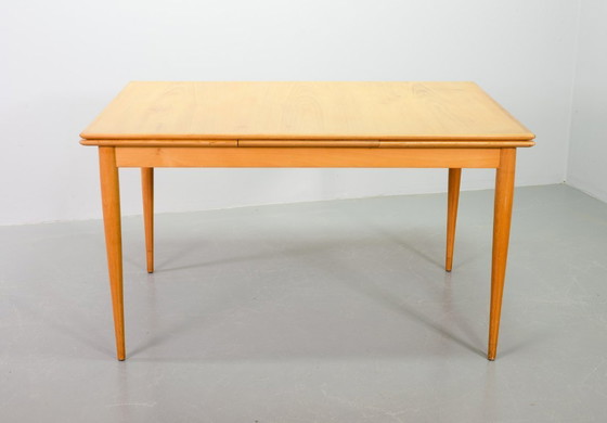 Image 1 of Large Mid-Century Design Extendable Solid Beech Wooden Dining Table in style of Arno Lambrecht. Germany, 1950s.