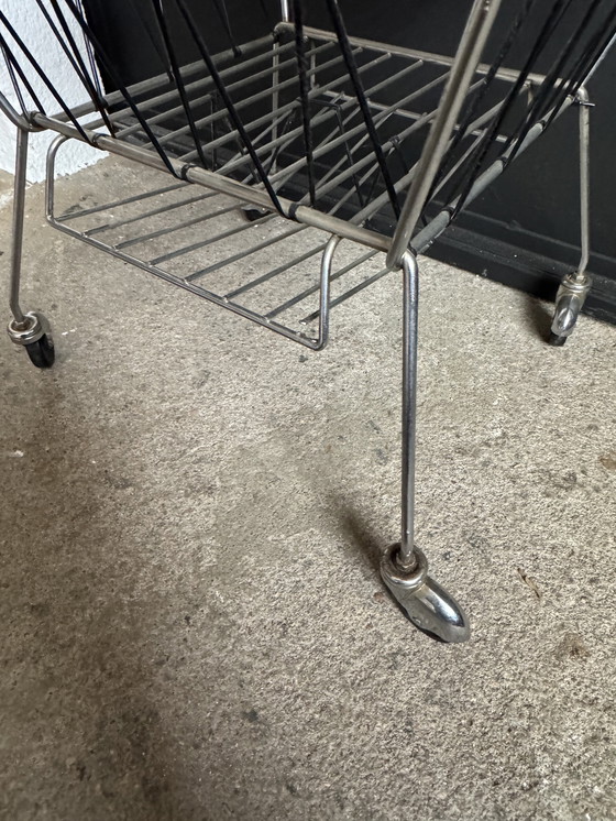 Image 1 of 1950s rolling newspaper rack