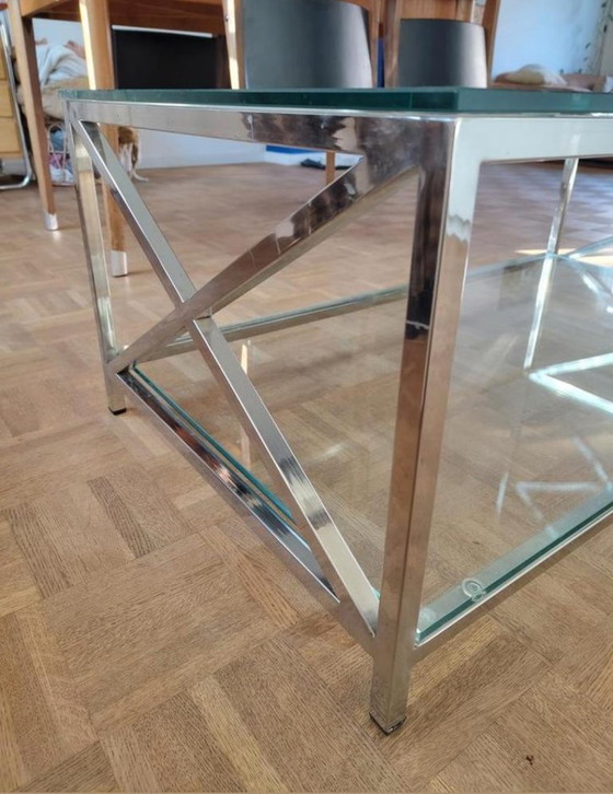 Image 1 of Table basse moderne en verre avec une structure métallique robuste