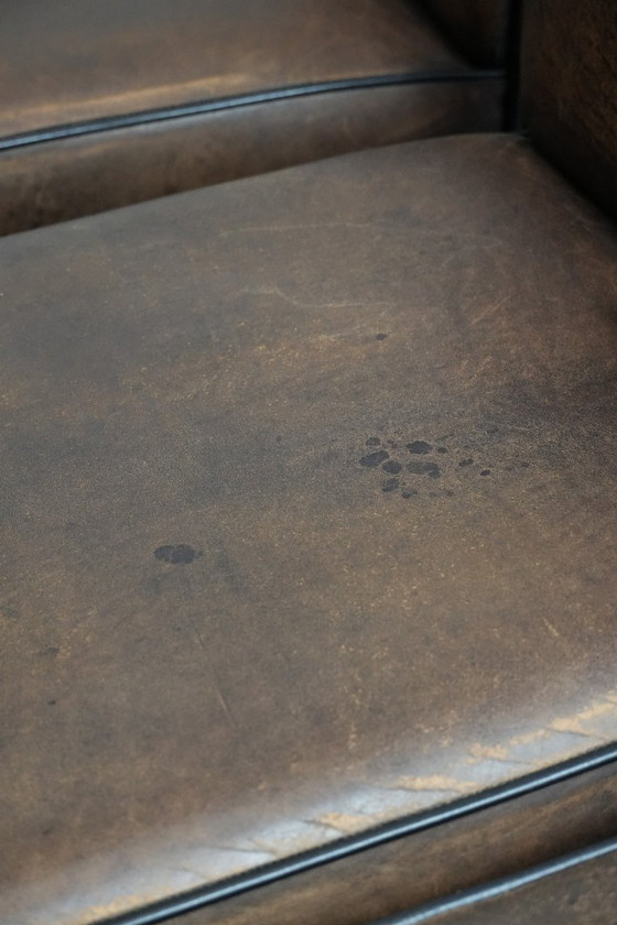 Image 1 of 8 x Tijdloze vintage schapenleren eetkamerstoel met karakter