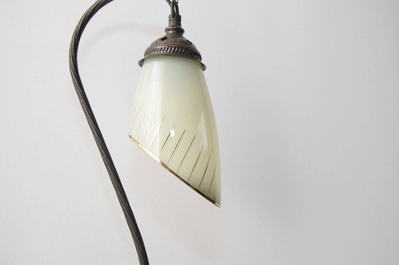 Image 1 of Vintage brass table lamp with curved arm and glass shade