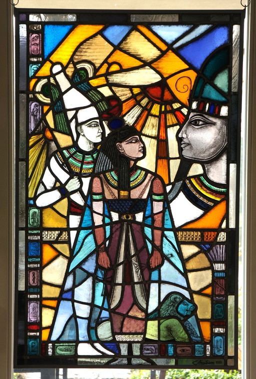 Stained glass in hanging exhibition rack.