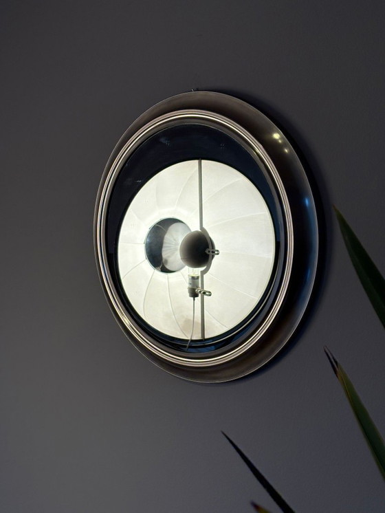 Image 1 of round mirror with metal frame, dating back to the 1970s