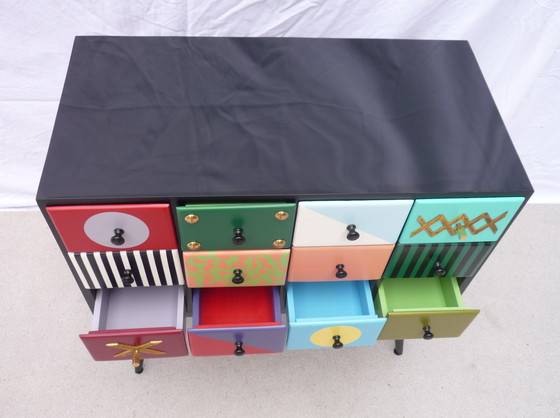 Image 1 of Minikast met 12 laden