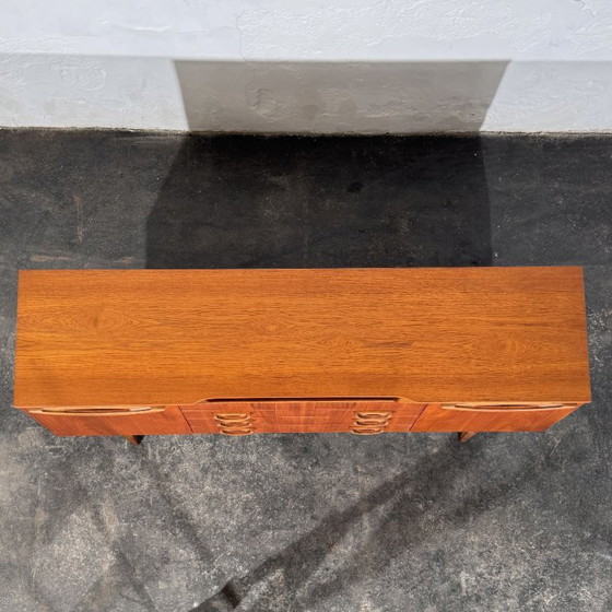 Beautility Teak Sideboard, 1960er Jahre – Holz (photo 12 of 20)