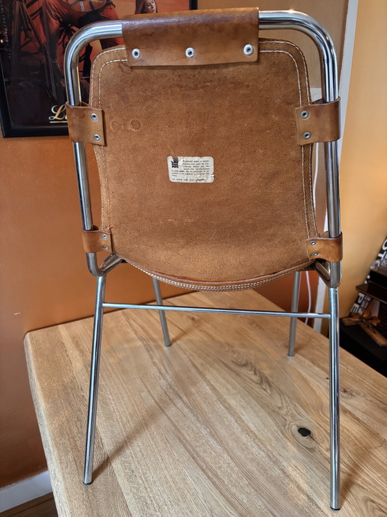 Image 1 of 2 les Arcs stoelen cognackleurig leer met chroom