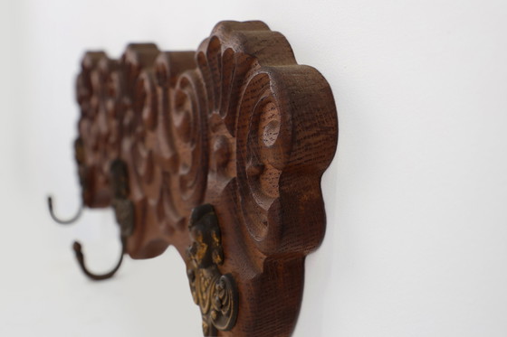 Image 1 of Antique Carved oak Wall mount coat rack with 3 brass angel hooks, France 1900s