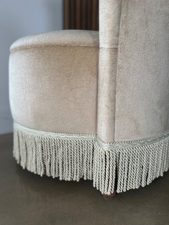 Image 1 of Vintage beige rokstoel met franje en opbergruimte