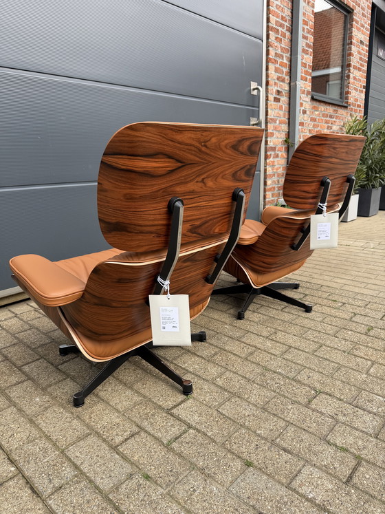 Image 1 of 2 poltrone lounge Vitra Eames XL originali con poggiapiedi, in pregiata pelle color cognac e palissandro Santos, NUOVE!!