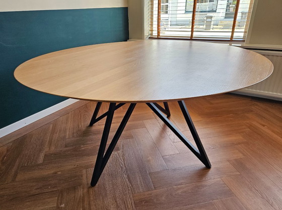 Image 1 of Studio Henk Round Dining Table 160cm Oak with Black Metal Butterfly Base